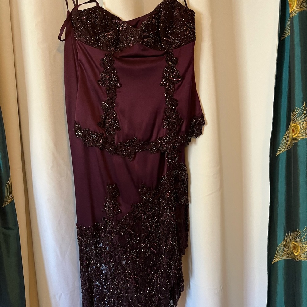 Beautiful and unique two piece silk dress with beading and lace.